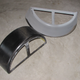 Frecks used a steel trailer fender (right) as the model for his carbon fiber fenders (left).